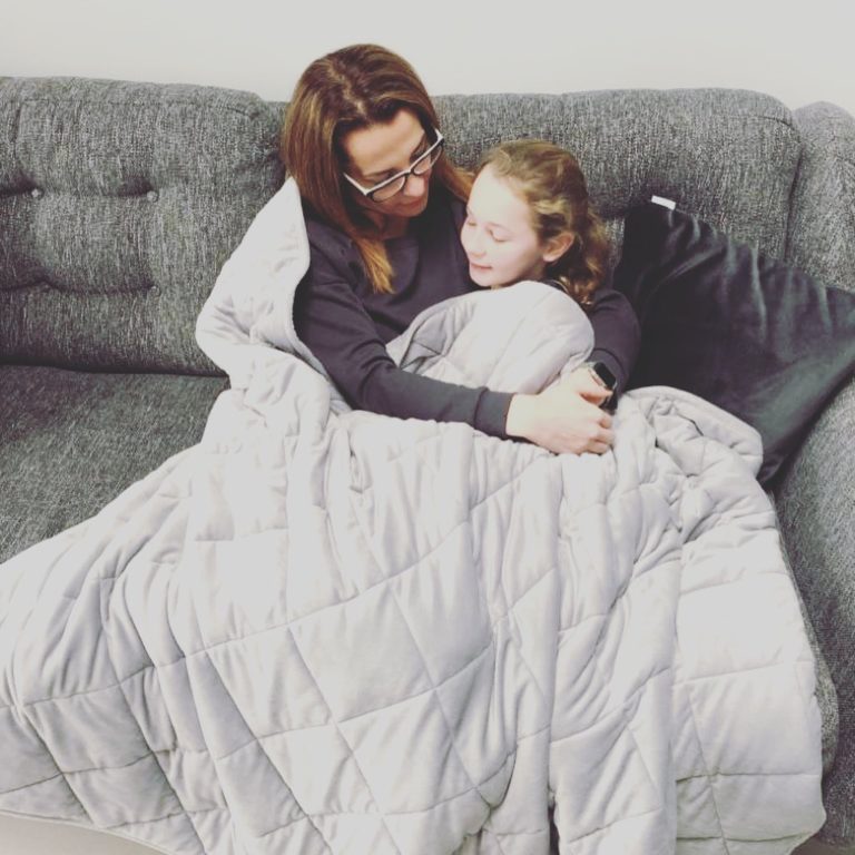 child and adult using kudd.ly